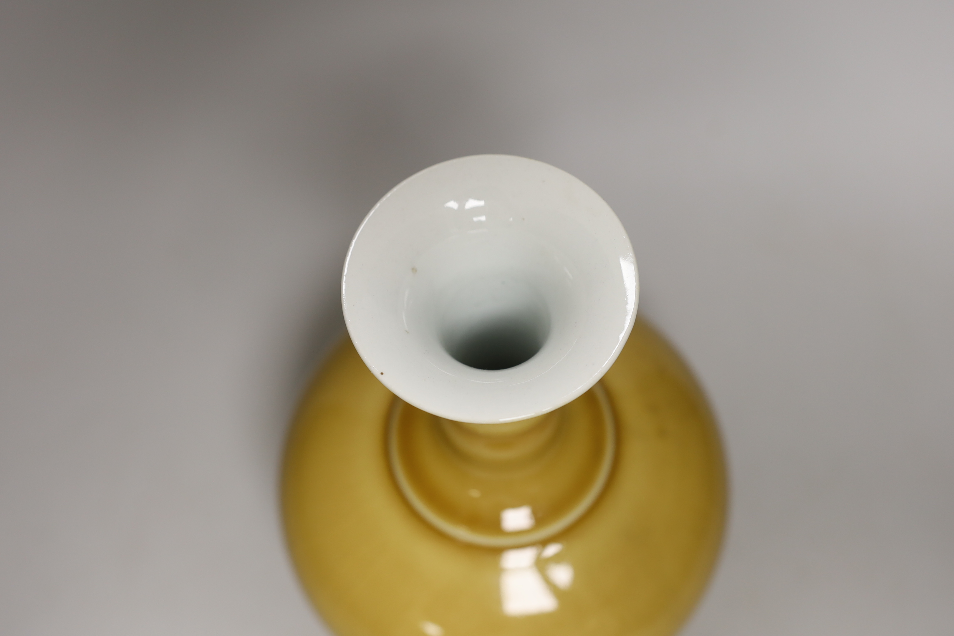 A Chinese yellow ground bottle vase, 25cm high